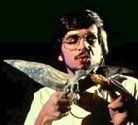 A puppeteer with the bogwing puppet used during filming.